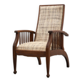 Arts & Craft oak armchair with spindle sides and tweed upholstery, Belgium