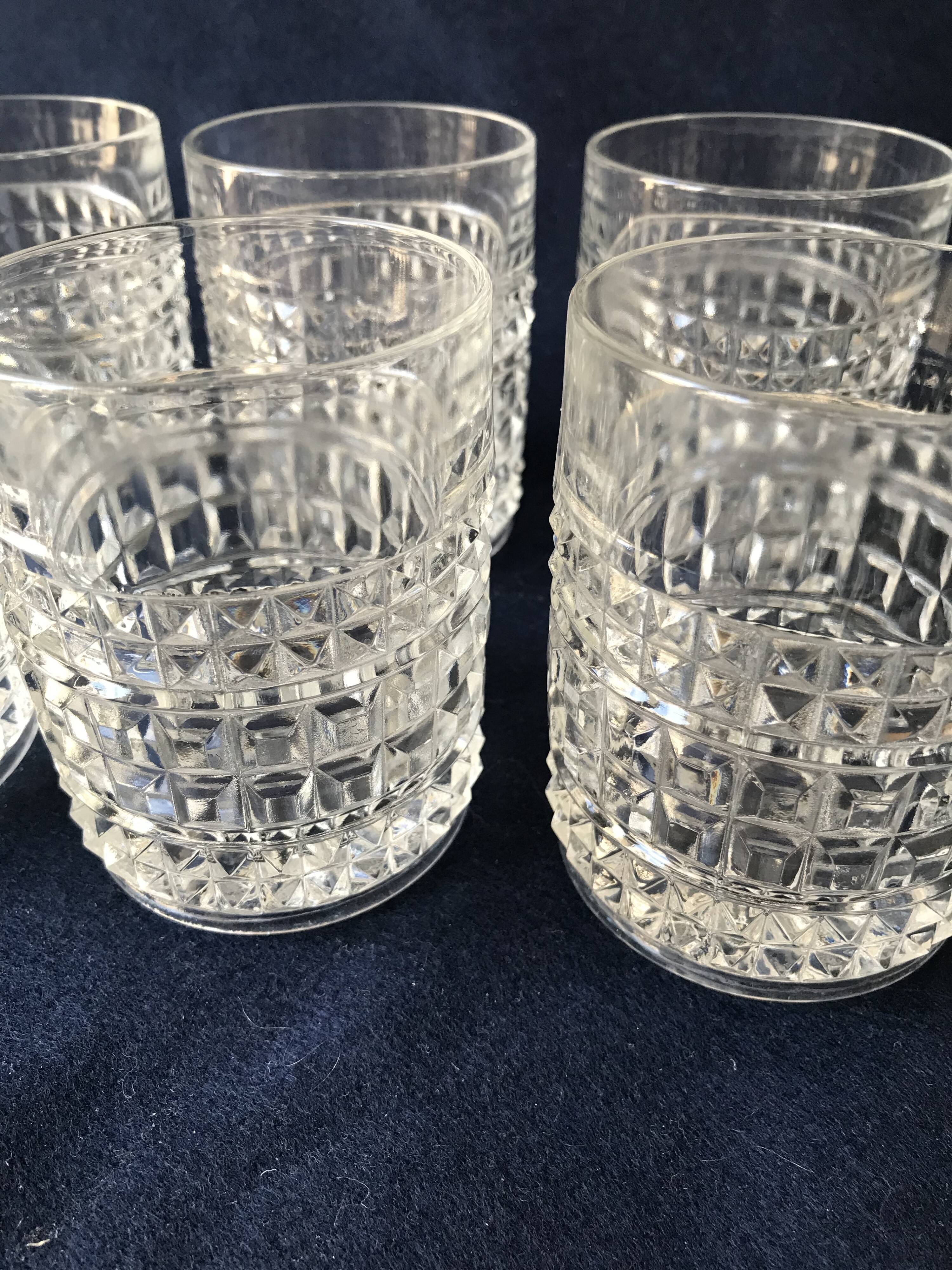 Six diamond-tipped cut glass cups