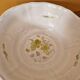 Henriot in Quimper - Glazed terracotta salad bowl with green flower decoration