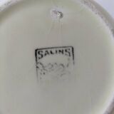 Two sugar bowls and a textured plate in turquoise and green Salins earthenware.