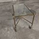 Rolling coffee table in vintage gilded bronze
