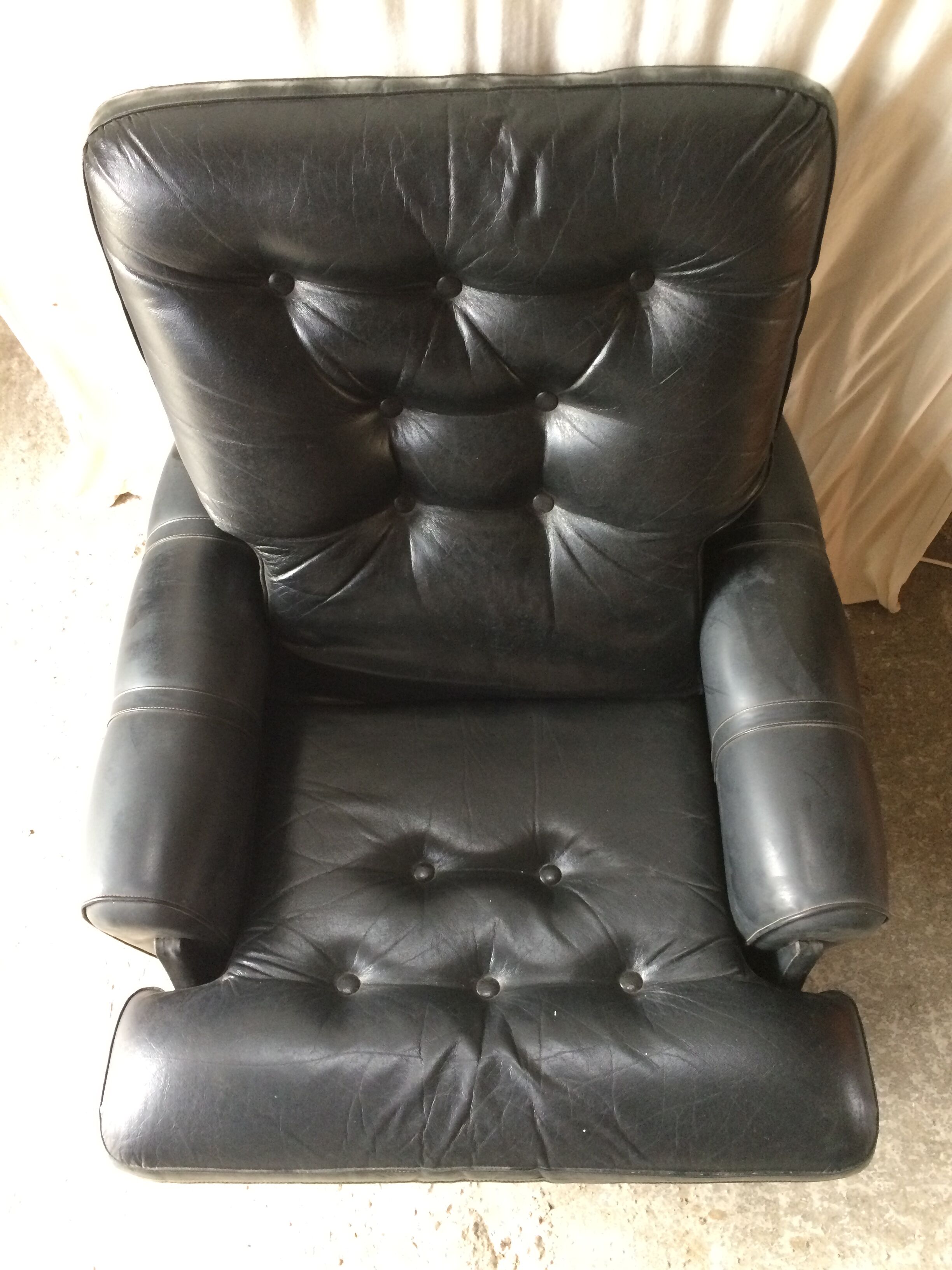 Former black leather chair