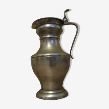 Large pitcher covered in tin