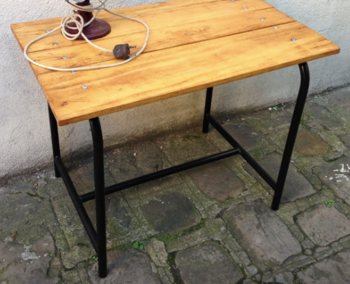 Small table low metal tubular base.