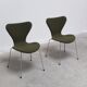 Pair of 'Series 7' chairs in green fabric by Arne Jacobsen for Fritz Hansen, 1980