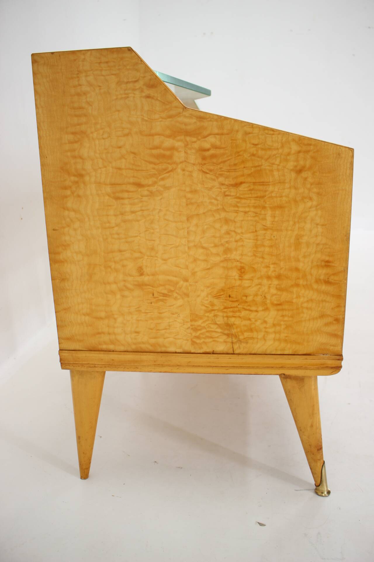 1960s italian sideboard/chest of drawers in high gloss finish with glass top and shelf