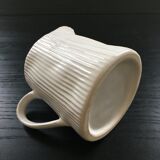 White pitcher streaked in relief