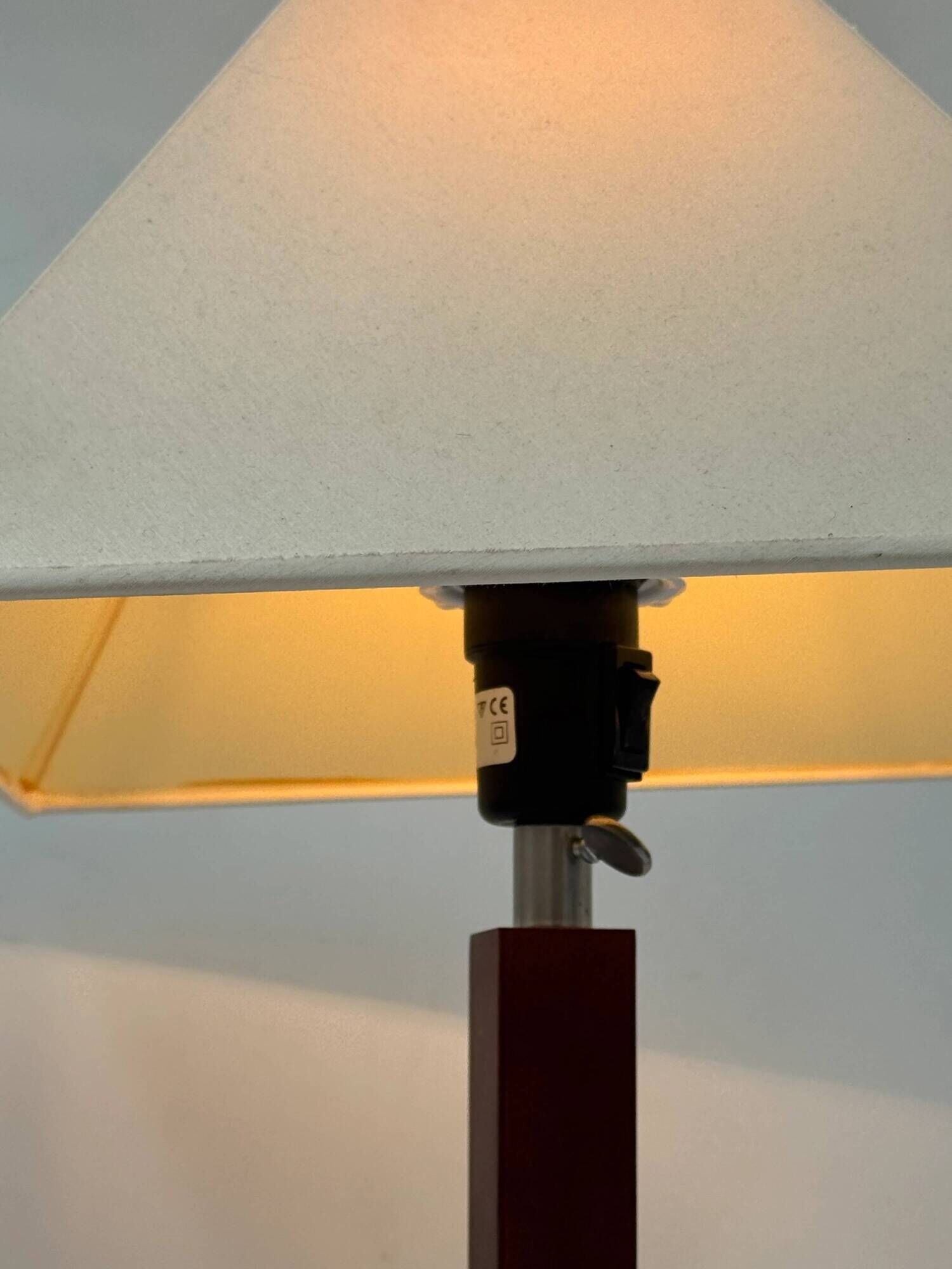 Vintage table lamp with a square wooden column and brushed steel base.