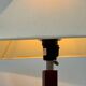 Vintage table lamp with a square wooden column and brushed steel base.