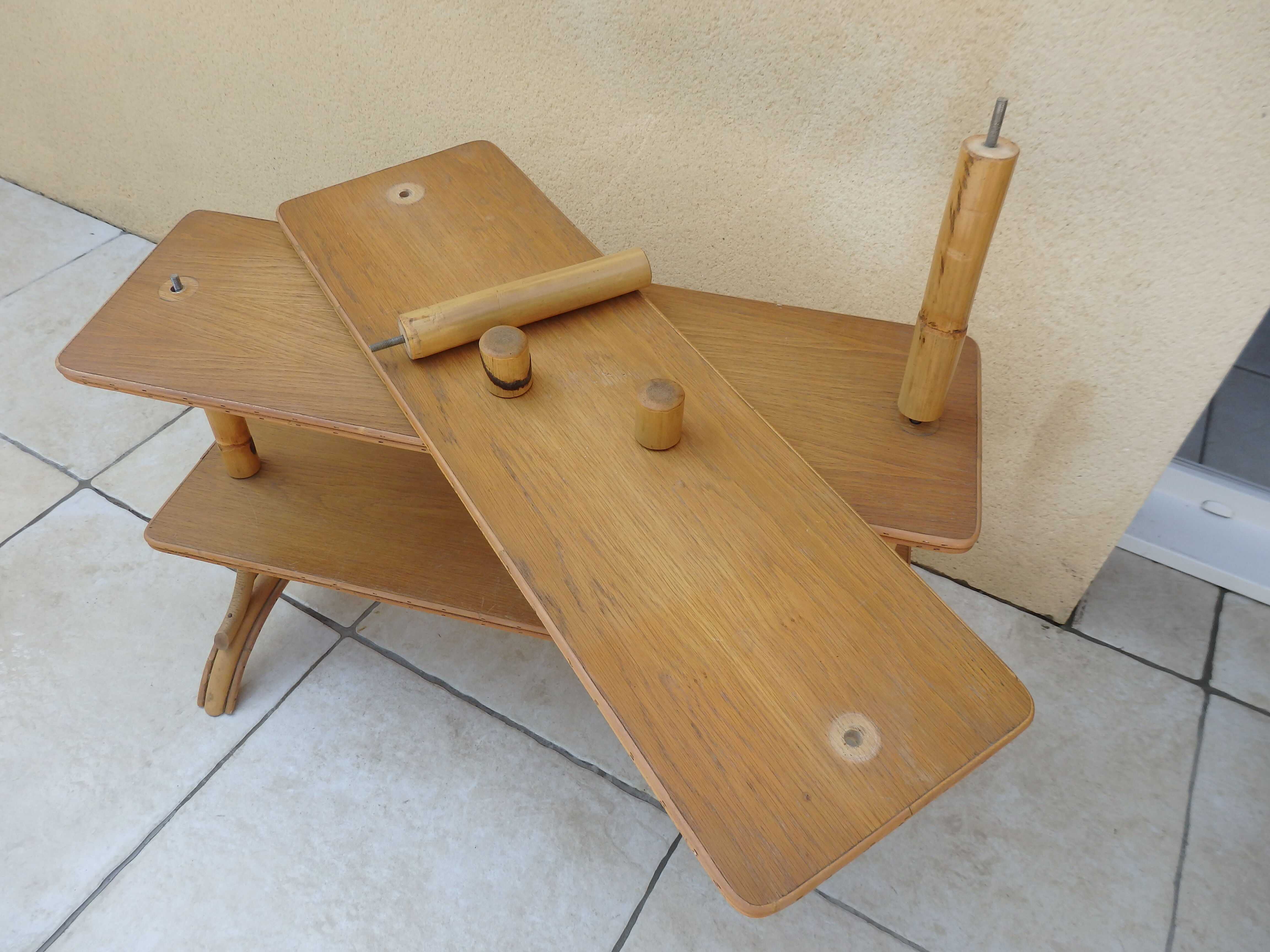 Vintage rattan shelf on feet