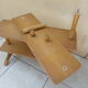Vintage rattan shelf on feet