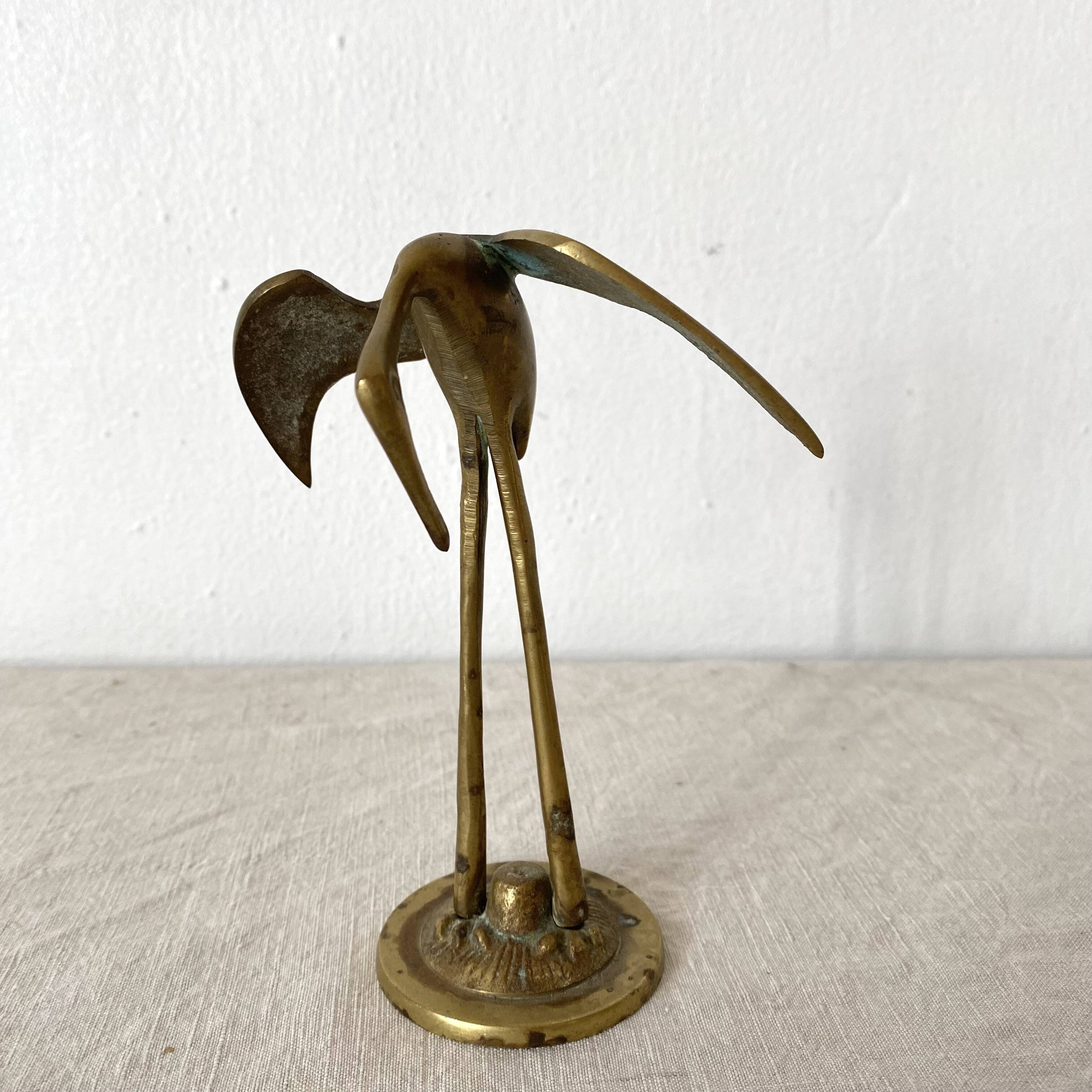 Golden brass bird