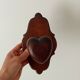 Vintage wall coat rack in carved solid wood, popular art.