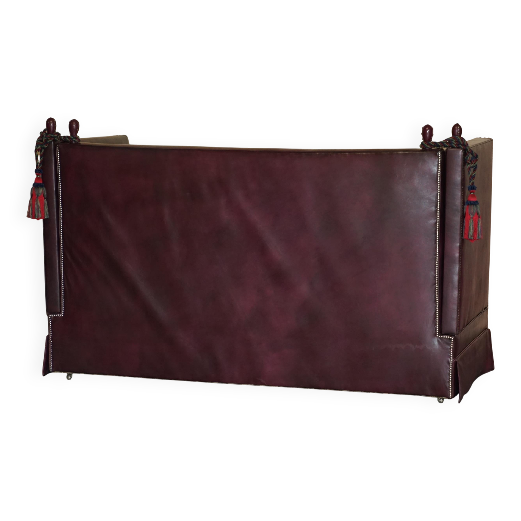 Victorian Knole canapé restored in leather with feather cushions.