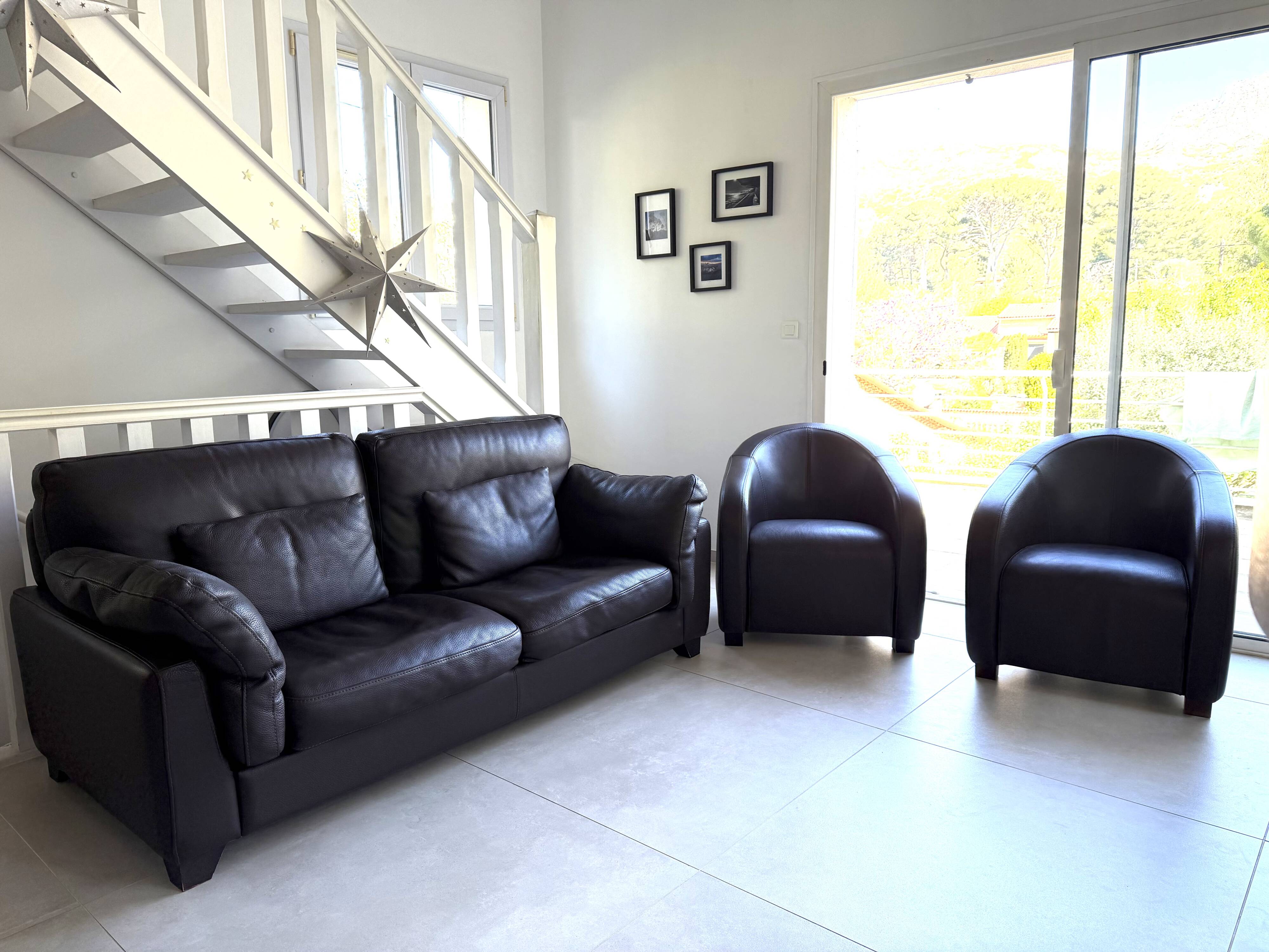 Lot 1 sofa and 2 armchairs by steiner model carthage.