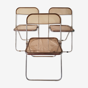 Trio of chairs folded Castelli design Giancarlo company