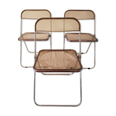 Trio of chairs folded Castelli design Giancarlo company