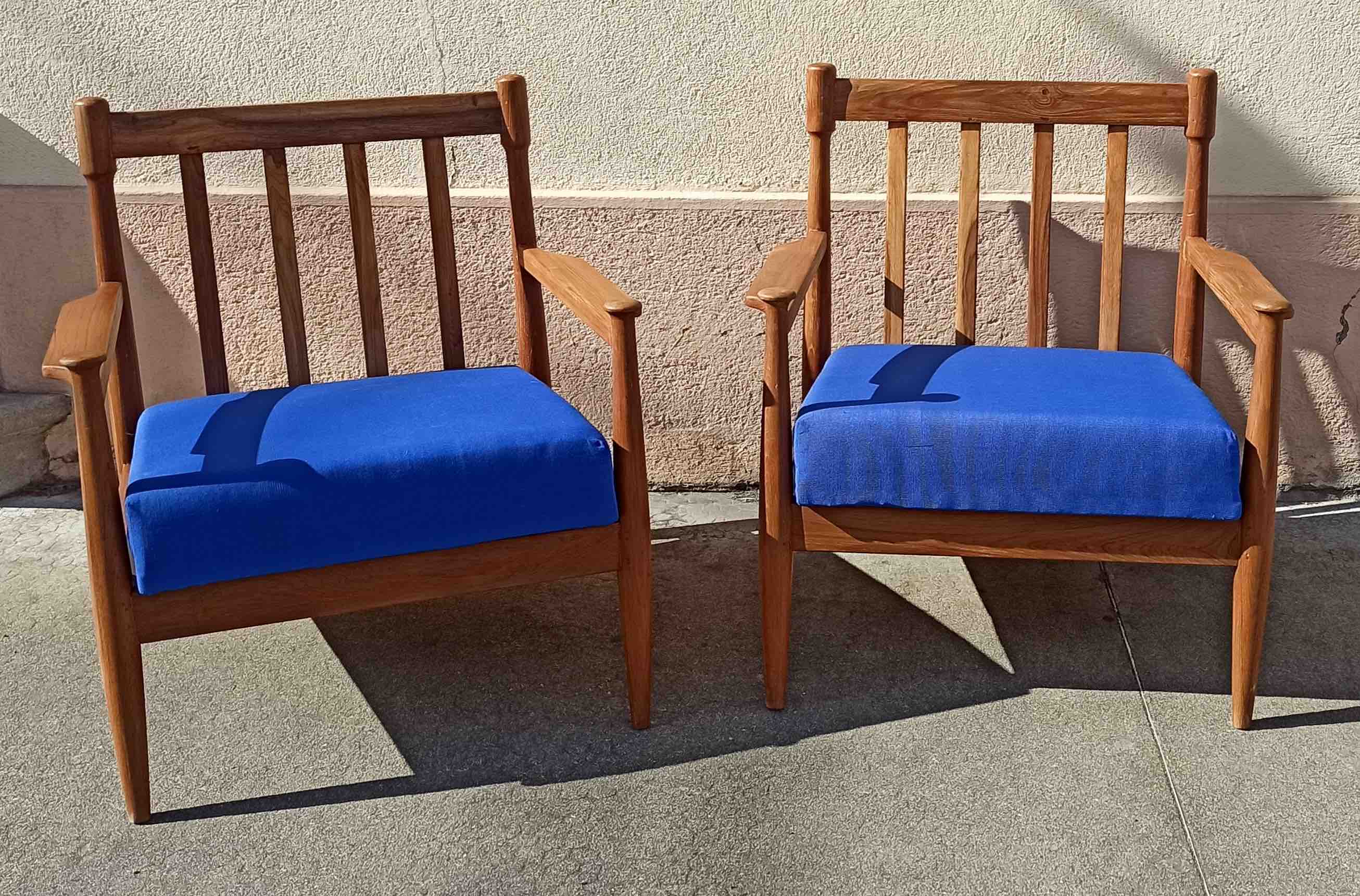 Pair of scandinavian armchairs in solid teak 50s