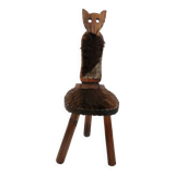 Brutalist cowhide tripod stool in solid wood