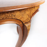 Round dining table of walnut, 1860s