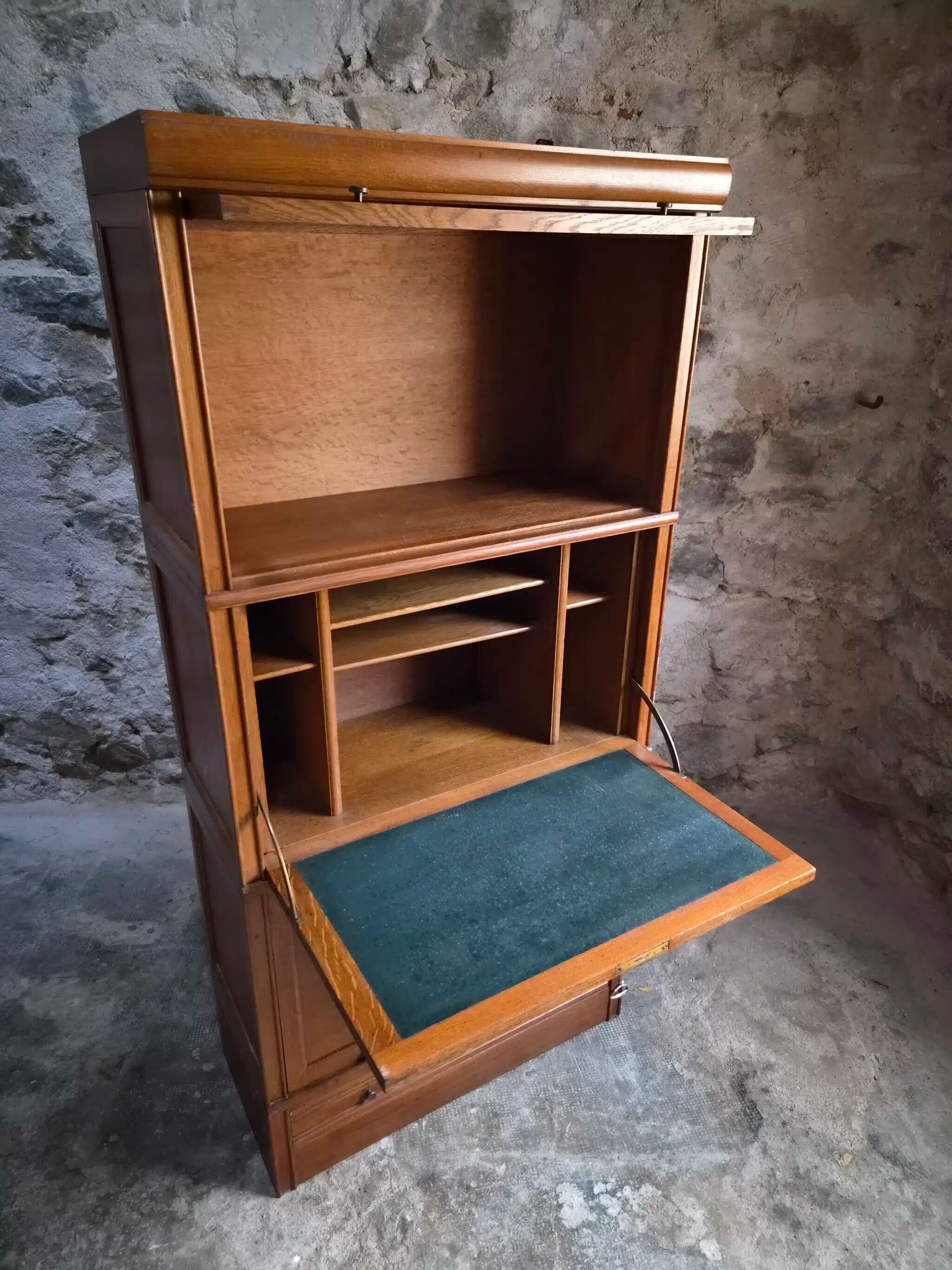 French modular secretary in oak with display case, 1950s.