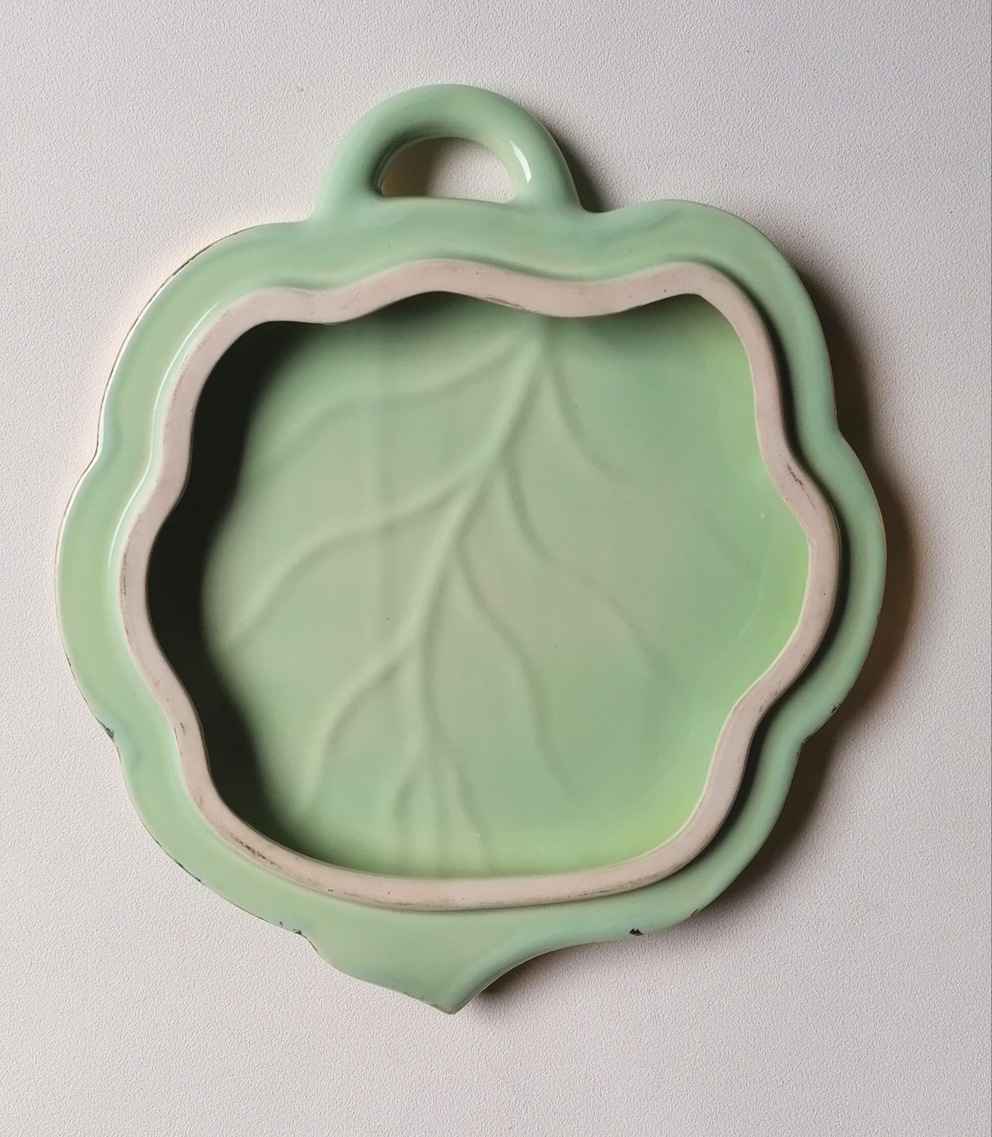 Celadon green leaf trivety and gilding