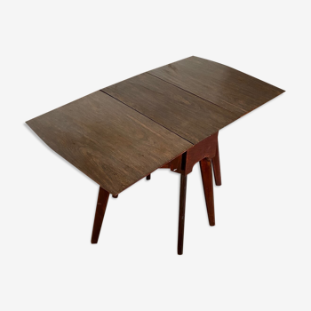 Table pliante en bois et formica 112 x 60,5 cm