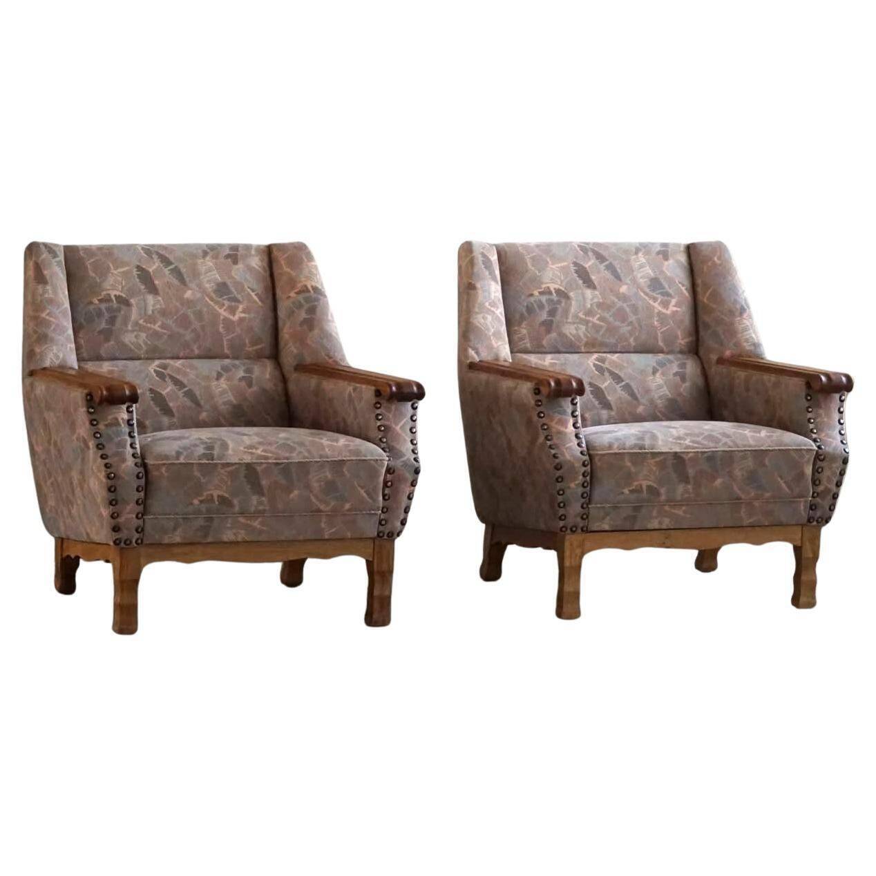 Mid-century modern Danish, pair of oak armchairs with original fabric, 1960s.
