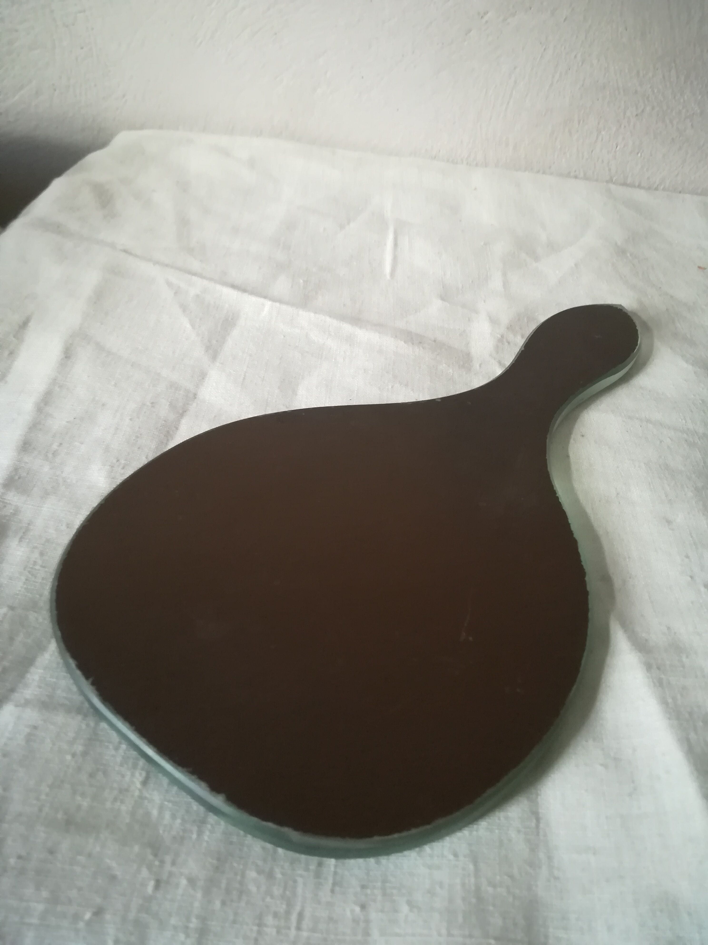 Mirror facing old hand