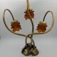 Lamp with brass leaves and glass paste flowers.