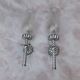 Pair of chrome and bubbled glass wall lights