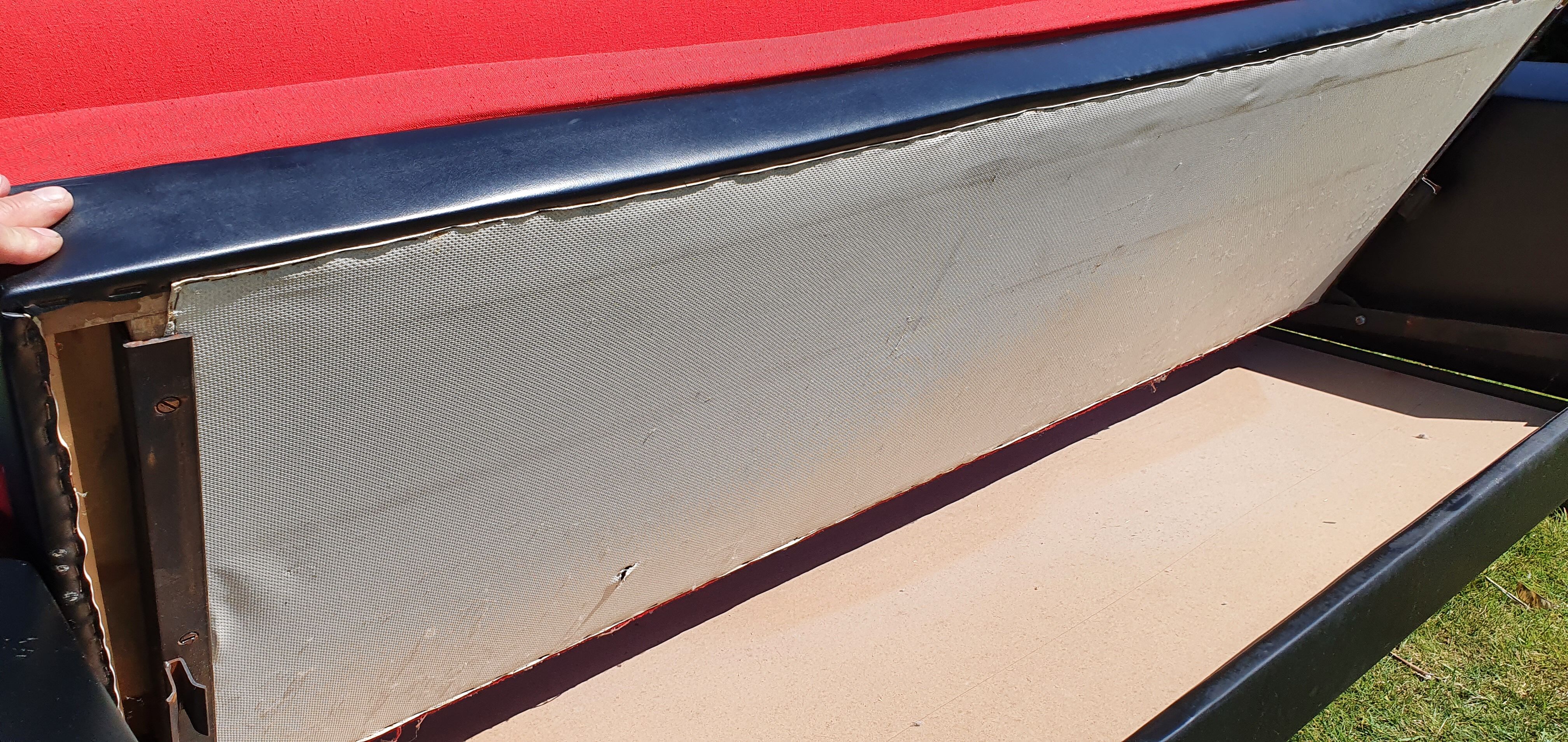 Vintage sofa 3 places convertible, red fabric and black skaï.1960s.