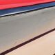 Vintage sofa 3 places convertible, red fabric and black skaï.1960s.