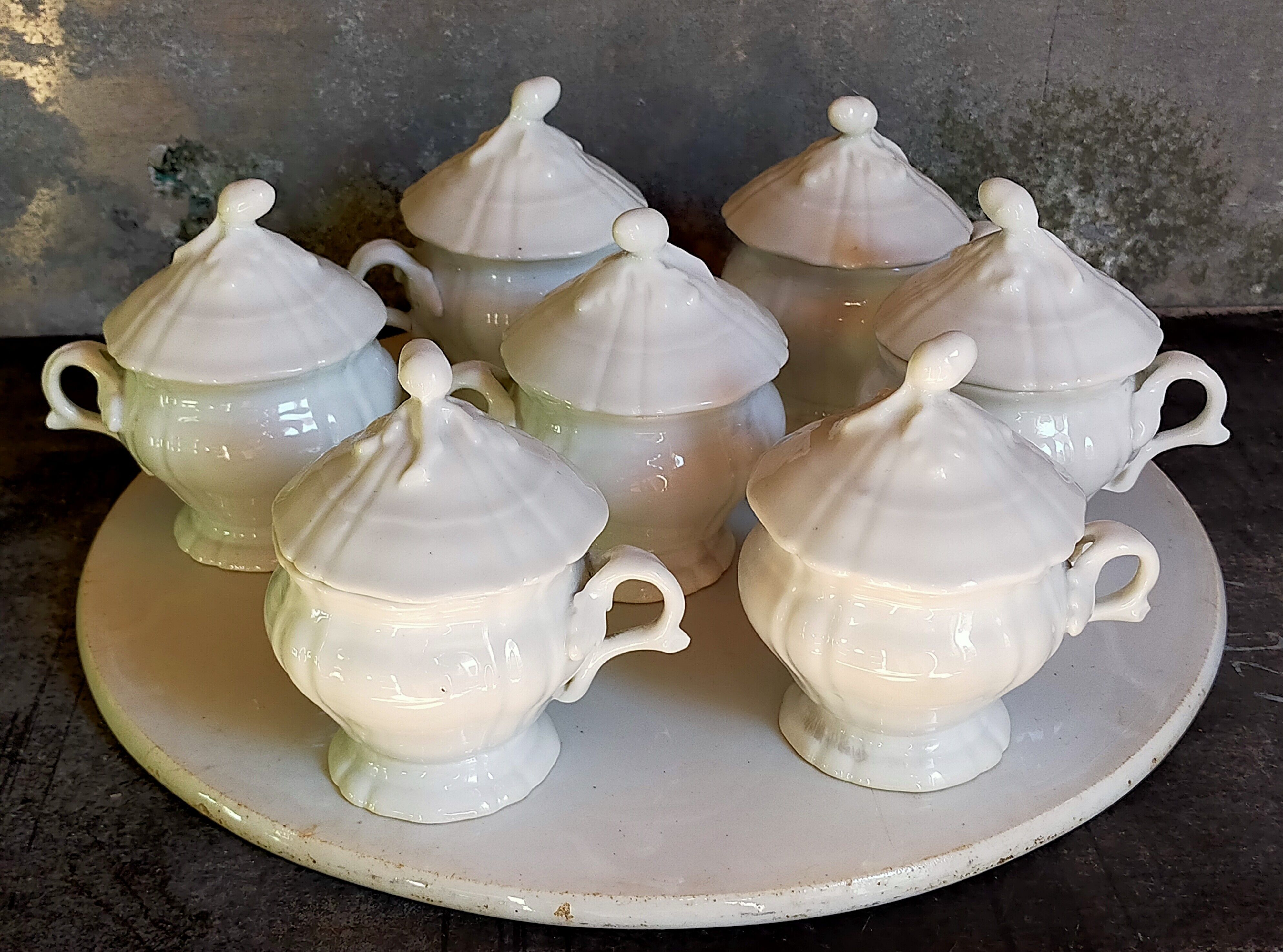 Set of seven covered pots and tray old white slurry nineteenth
