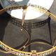 Table basse rode de salon marbre onyx et bronze