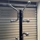 1970s coat rack with a marble base and chrome arms.