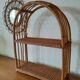 Rattan wall shelf