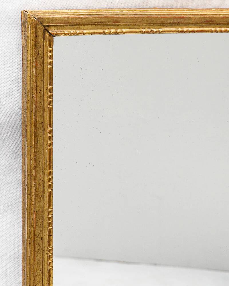 Small Louis XVI giltwood "square" mirror