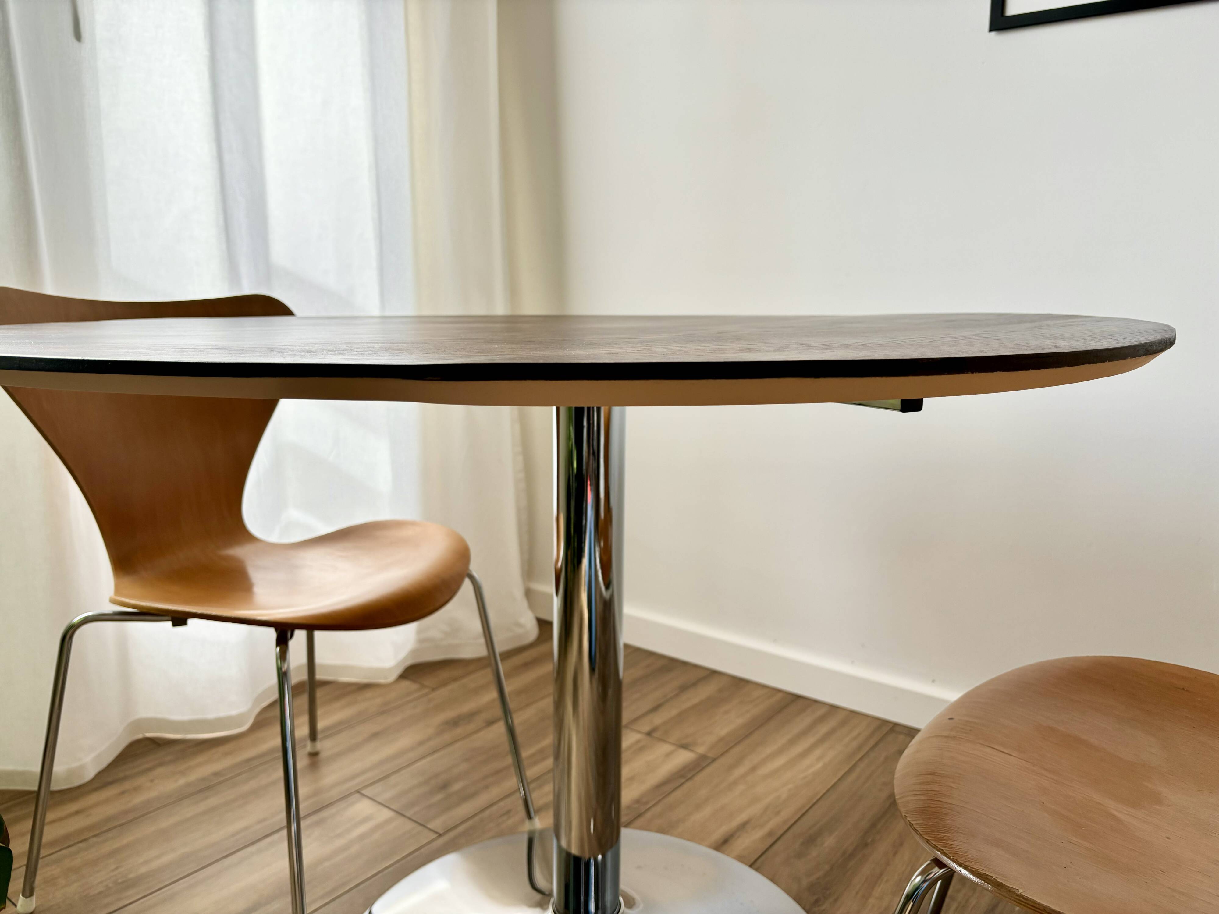 Tulip dining table with chrome base