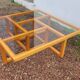 Modernist vintage square coffee table, in wood and old glass