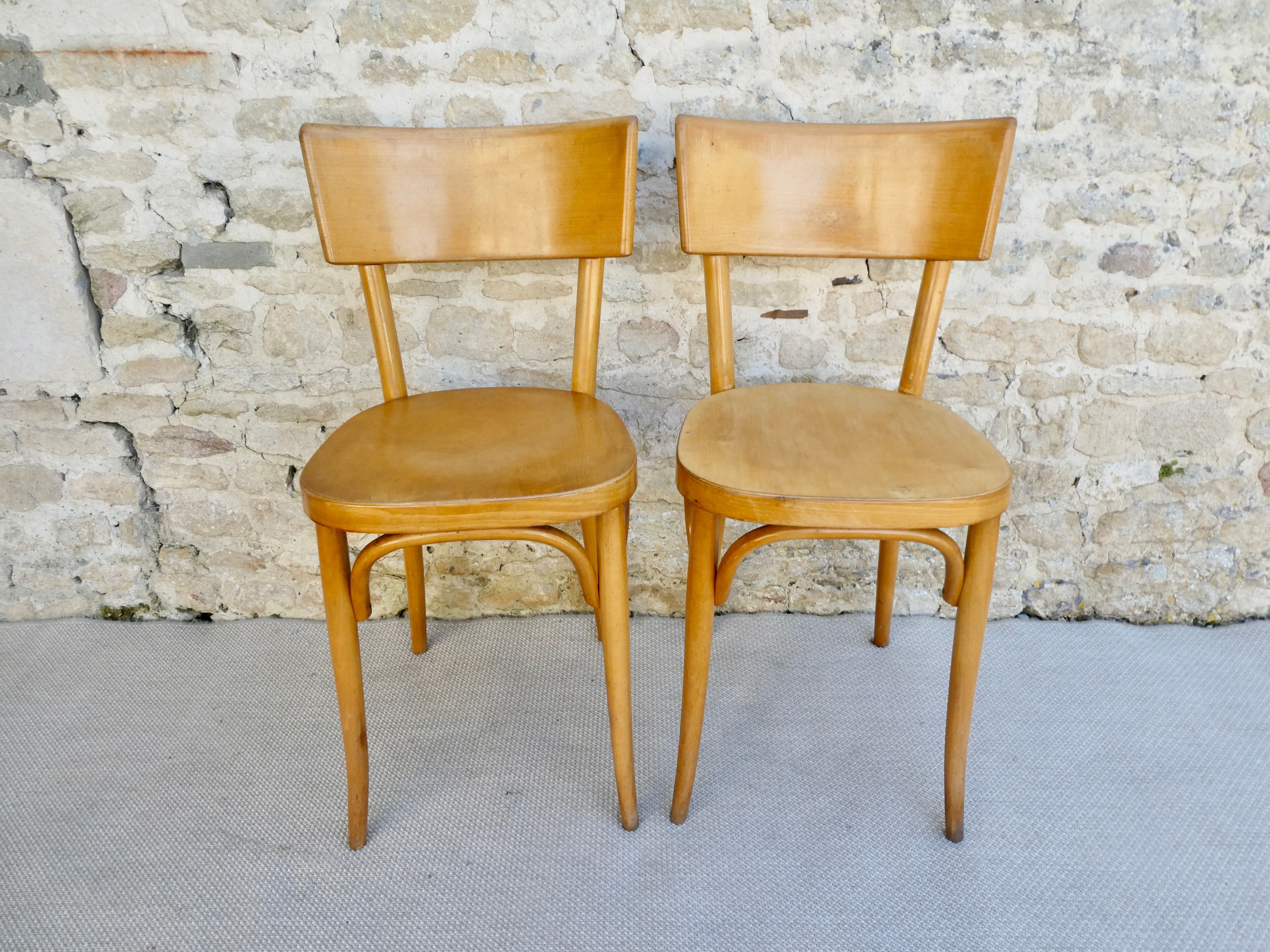 Pair of Baumann bistro chairs in light wood