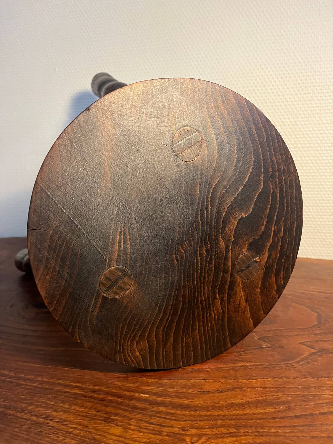 Round tripod stool with turned wooden legs