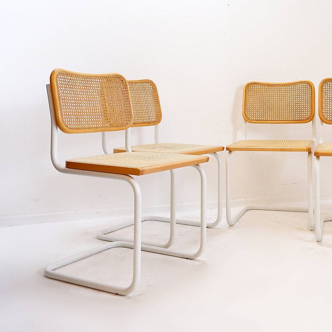 Set of 4 Italian rattan and white metal chairs