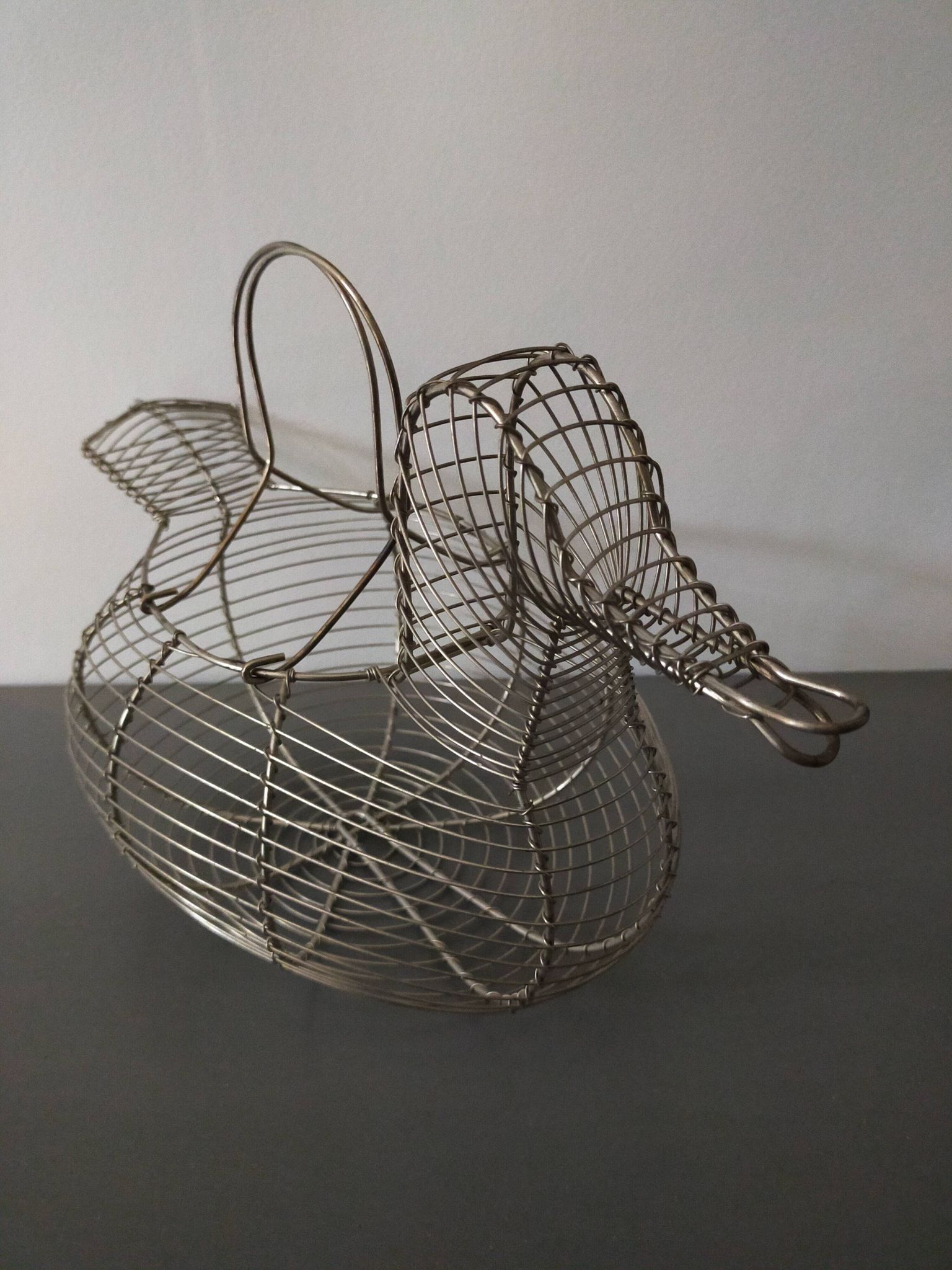 Vintage duck shaped metal egg basket in very good condition
