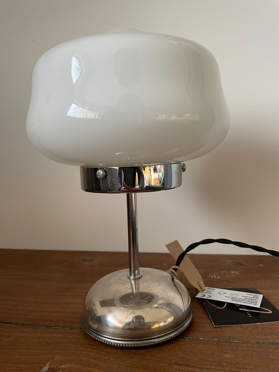 White opaline lamp with silver metal.