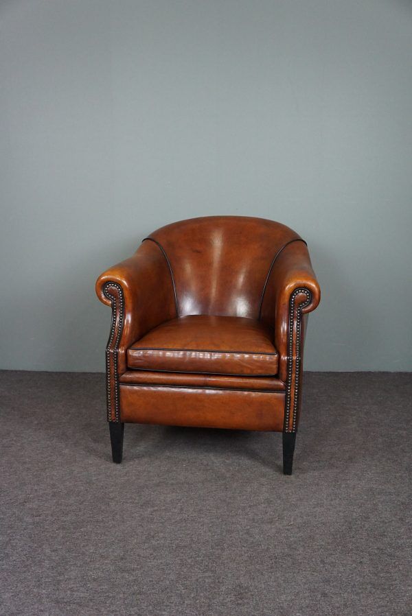 Leather club chair with black piping