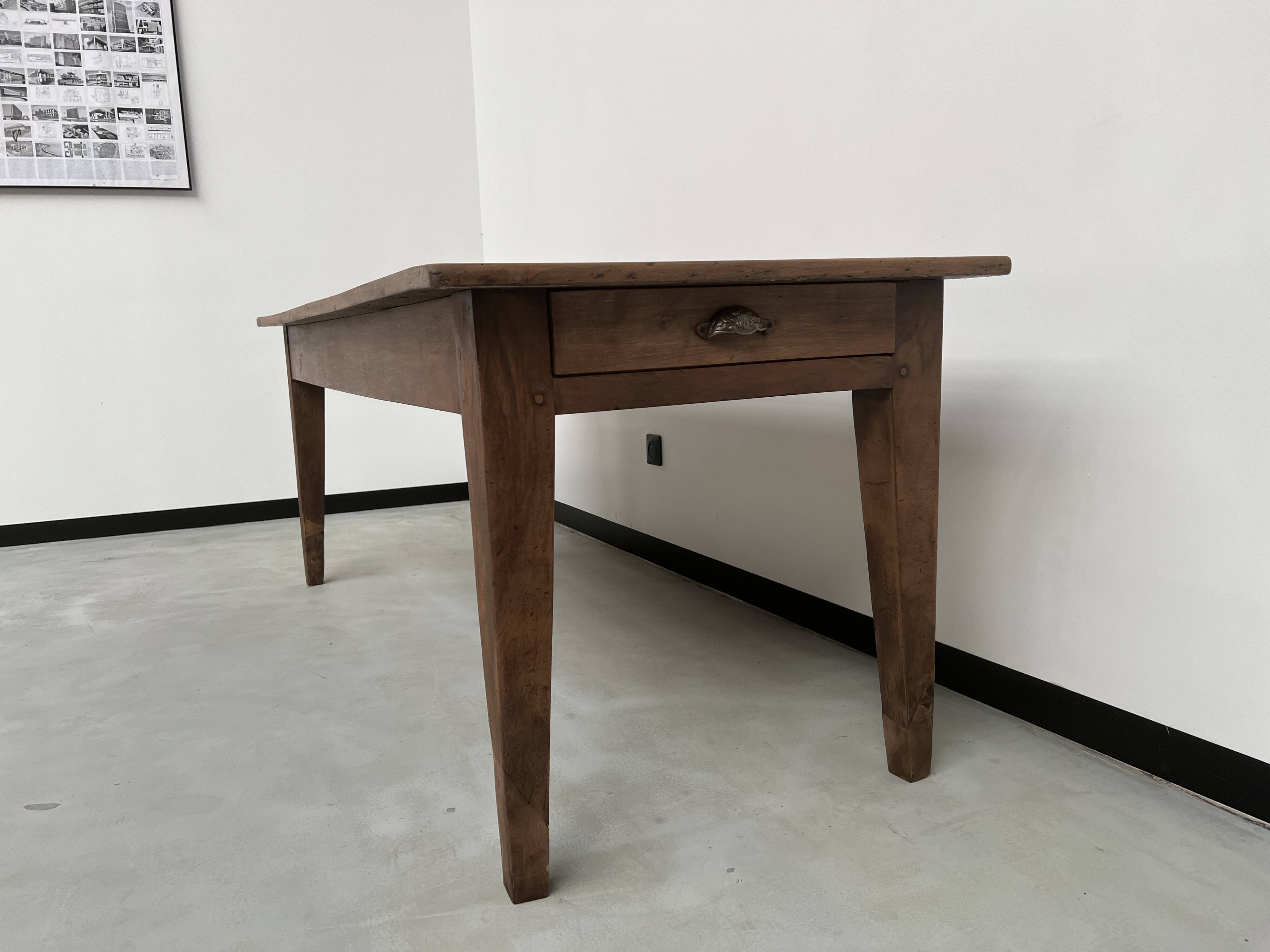 Solid walnut farmhouse table with spindle legs