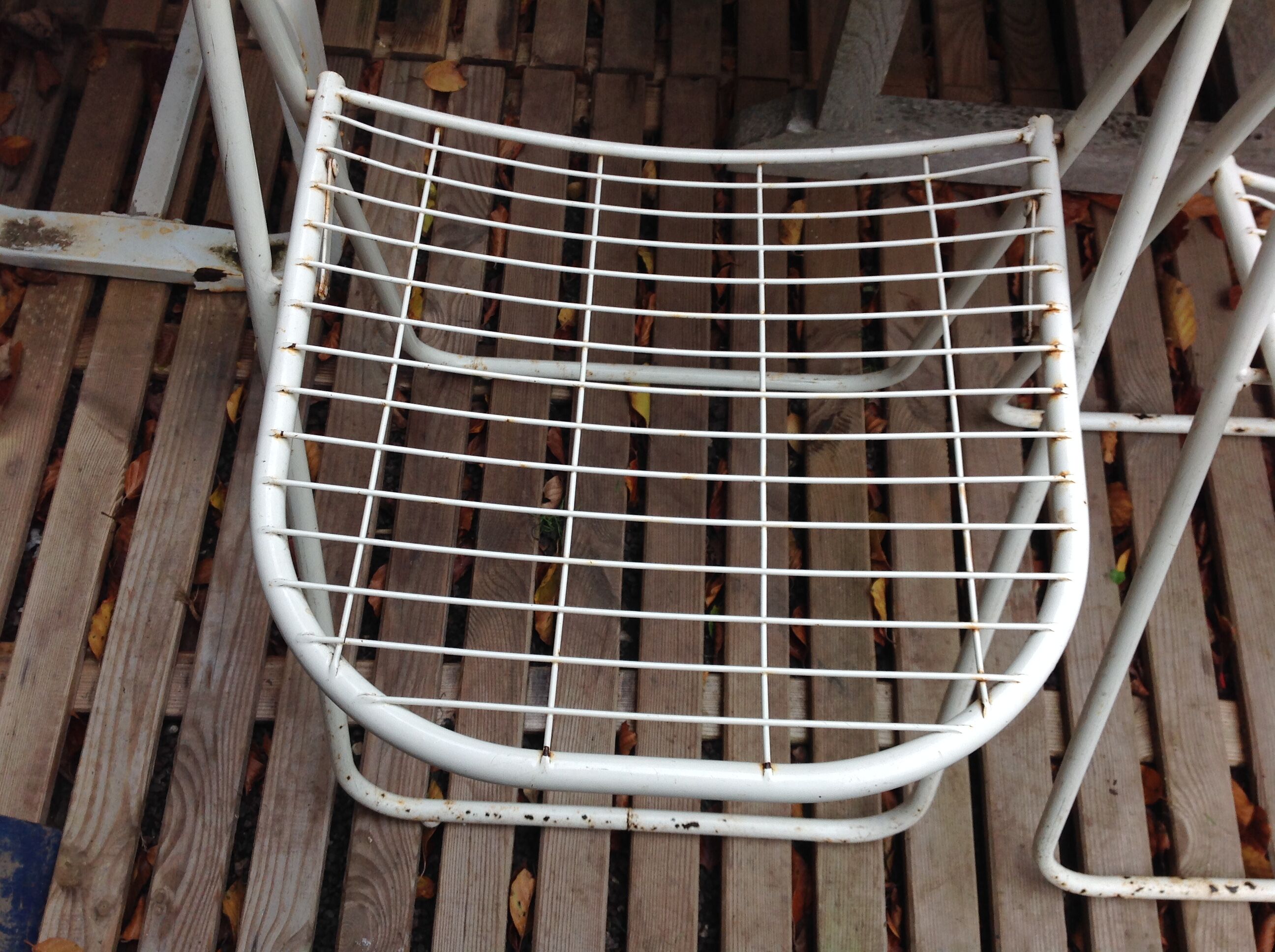 Trio of folding metal chairs