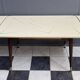 cream and green color 1960s formica dining table enlarge and changing in height
