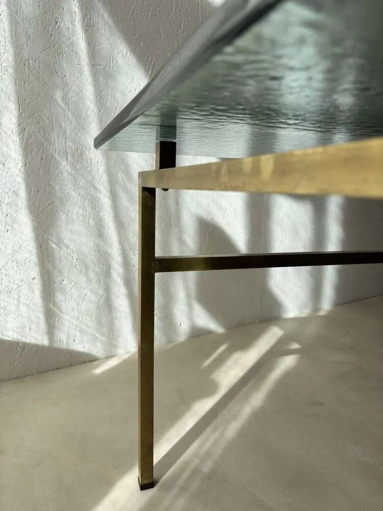 Swedish brass coffee table with a marbled glass top from the 1960s.